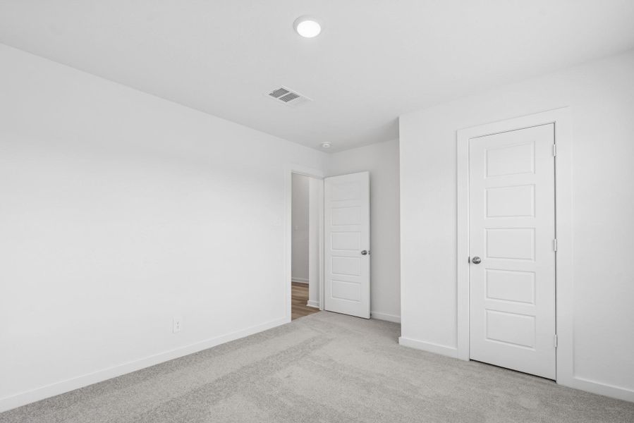 Spacious, unfurnished interior of a new home in Pinewood at Grand Texas, New Caney (Image 15).