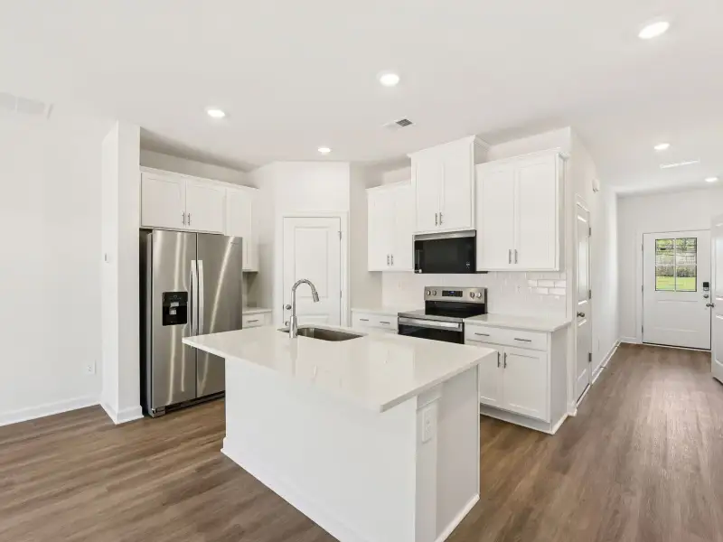 Furnished interior view inside a new home in Rocky River Towns, Charlotte (Image 3).