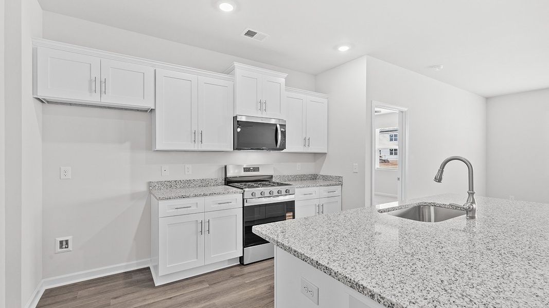 Furnished interior view inside a new home in Highland Hills, Graniteville (Image 7).