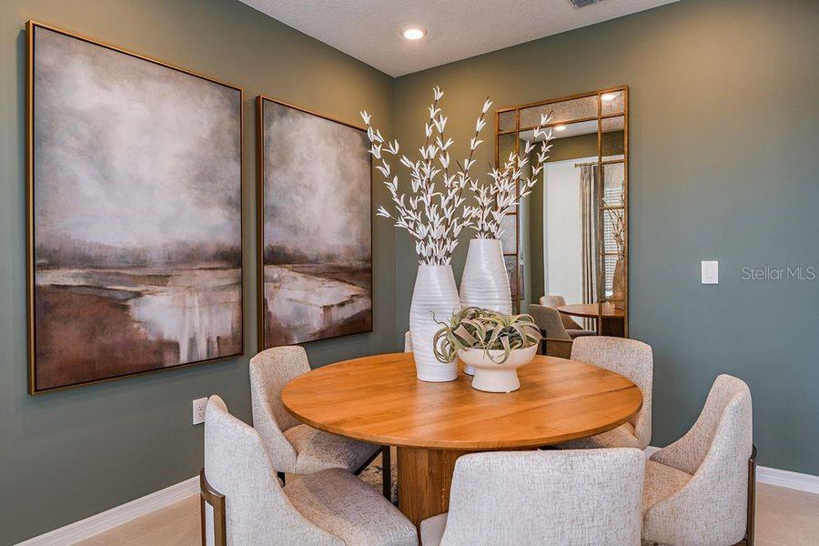Furnished interior view inside a new home in Harvest at Ovation, Winter Garden (Image 31).