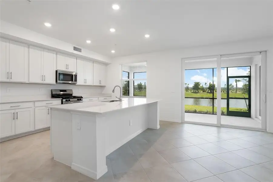 Furnished interior view inside a new home in Calusa Country Club, Lakewood Ranch (Image 9).