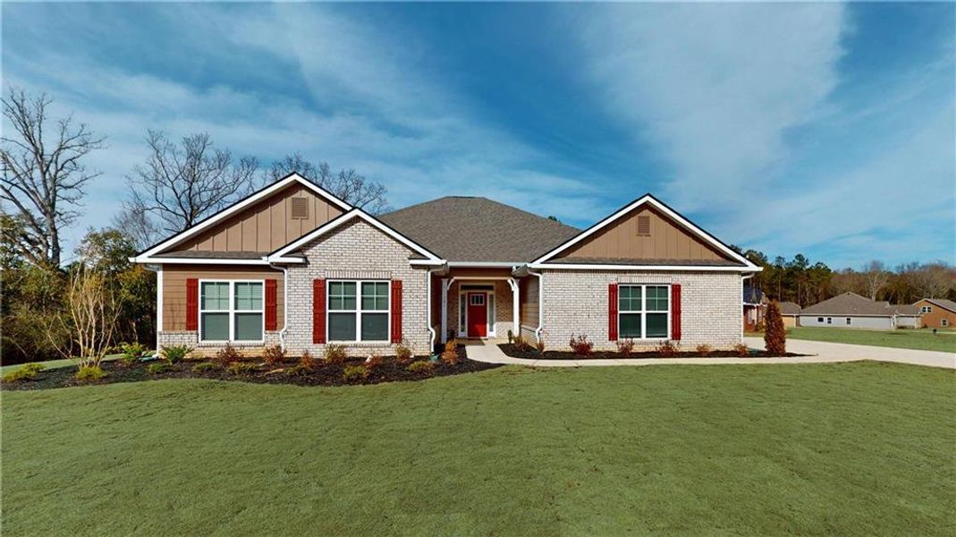 Front exterior of a new home in Holliday Pass, Griffin, GA, highlighting curb appeal (Image 2). Front exterior of a new home in Holliday Pass, Griffin, GA, highlighting curb appeal (Image 2).