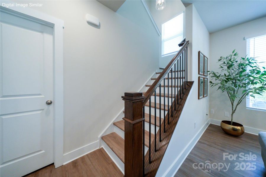 Digital Image Similar - Iron Balustrades at stairs.  Large storage area under stairway.