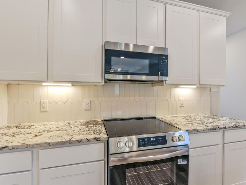 Furnished interior view inside a new home in Spring Branch Crossing, Conroe (Image 17).
