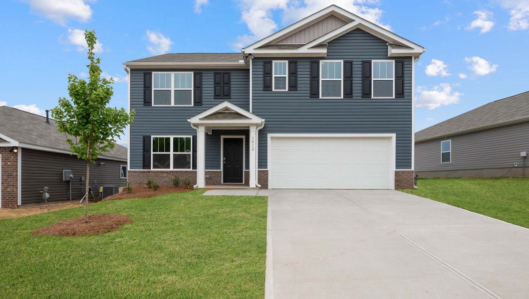 Front exterior of a new home in Bentley Park, Greenwood, SC, highlighting curb appeal (Image 1). Front exterior of a new home in Bentley Park, Greenwood, SC, highlighting curb appeal (Image 1).