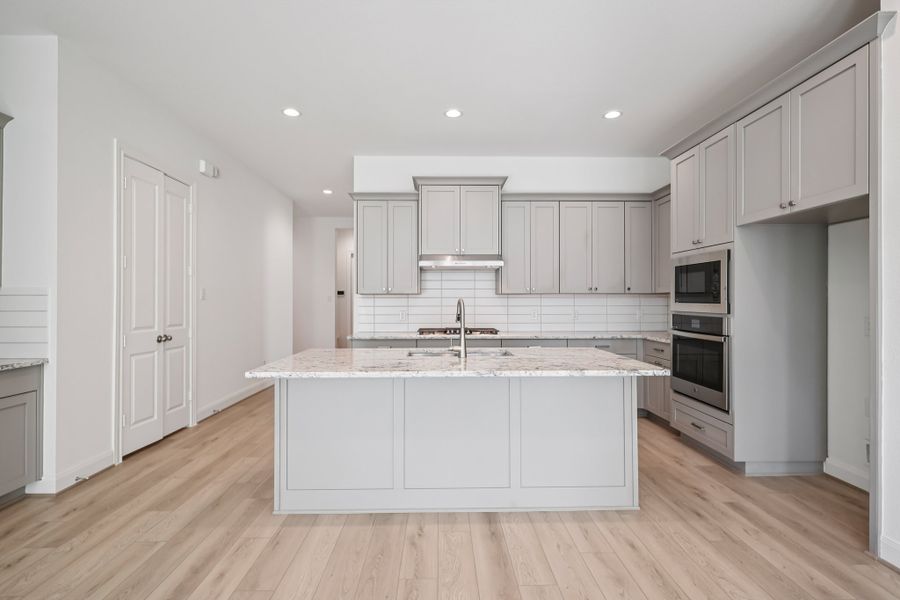 Representative furnished interior of a home built from the Kyle by Risewell Homes in Marvida, Cypress (Image 6).