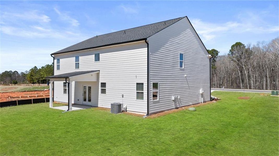 Exterior details and patio area of a home in Kingston Ranch at Lake Oconee, Buckhead (Image 29).