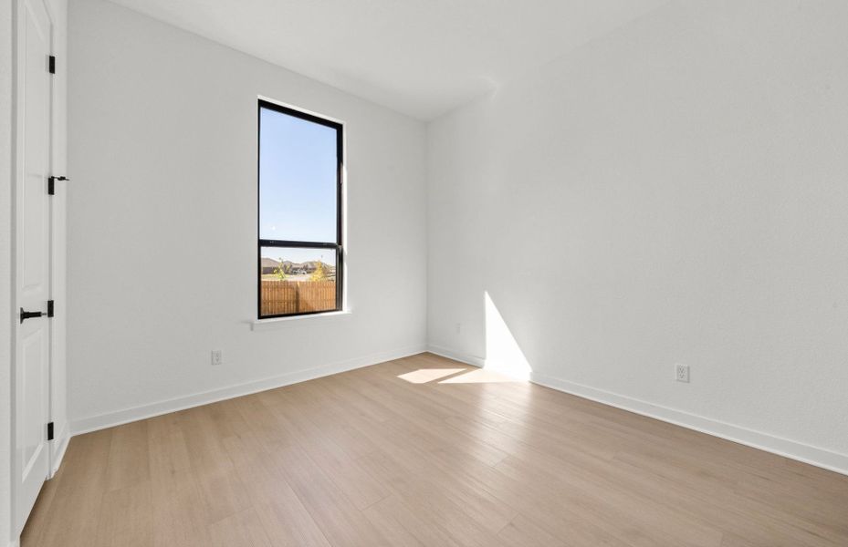Spacious, unfurnished interior of a new home in 6 Creeks, Kyle (Image 37).
