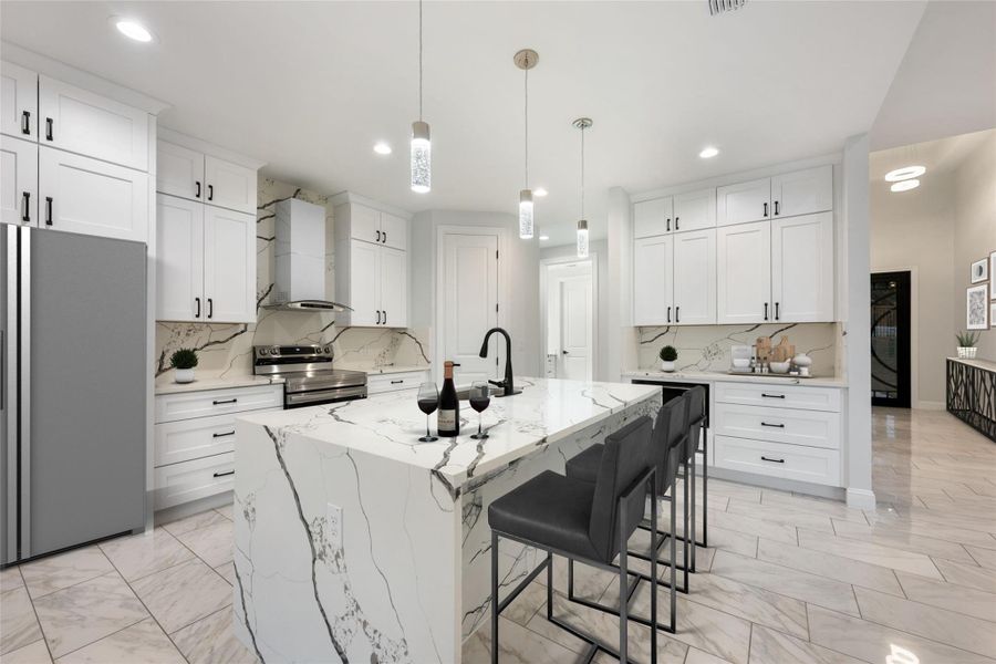 Kitchen with stainless steel appliances, light stone countertops, a breakfast bar area, and white cabinetry