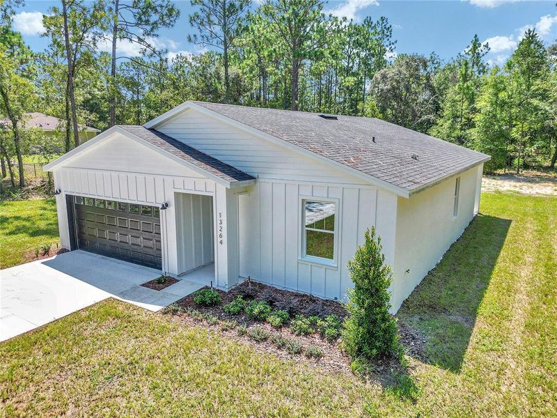 Front exterior of a new home in , Ocala, FL, highlighting curb appeal (Image 28).
