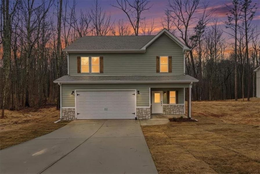 Front exterior of a new home in , Carrollton, GA, highlighting curb appeal (Image 20).