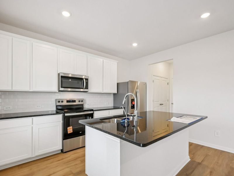 Furnished interior view inside a new home in Eastern Wells, Jarrell (Image 3).