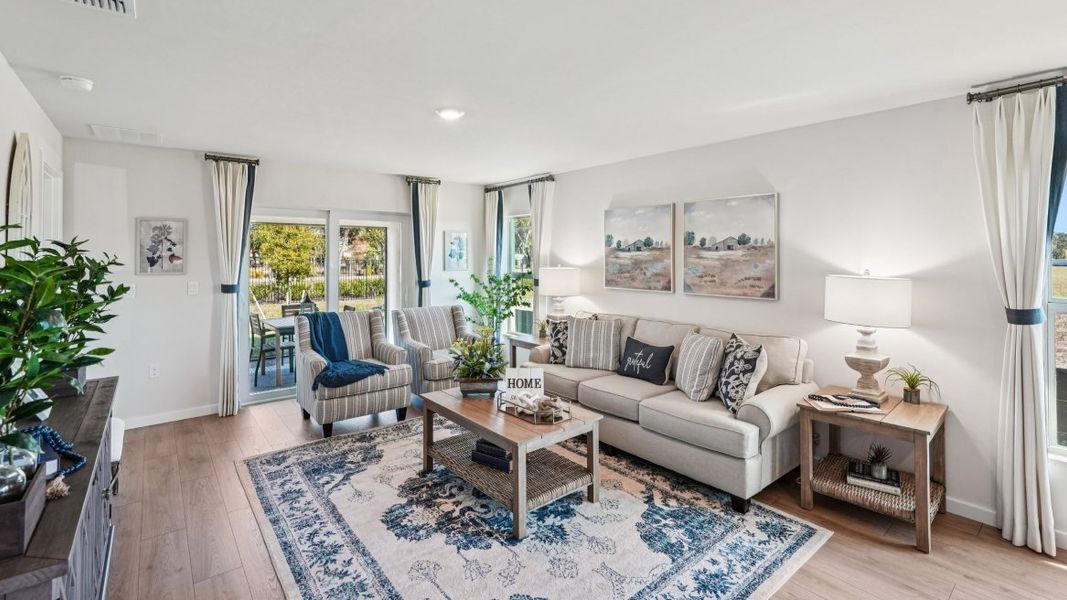 Furnished interior view inside a new home in Coral Bay - Express & Tradition, North Fort Myers (Image 7).