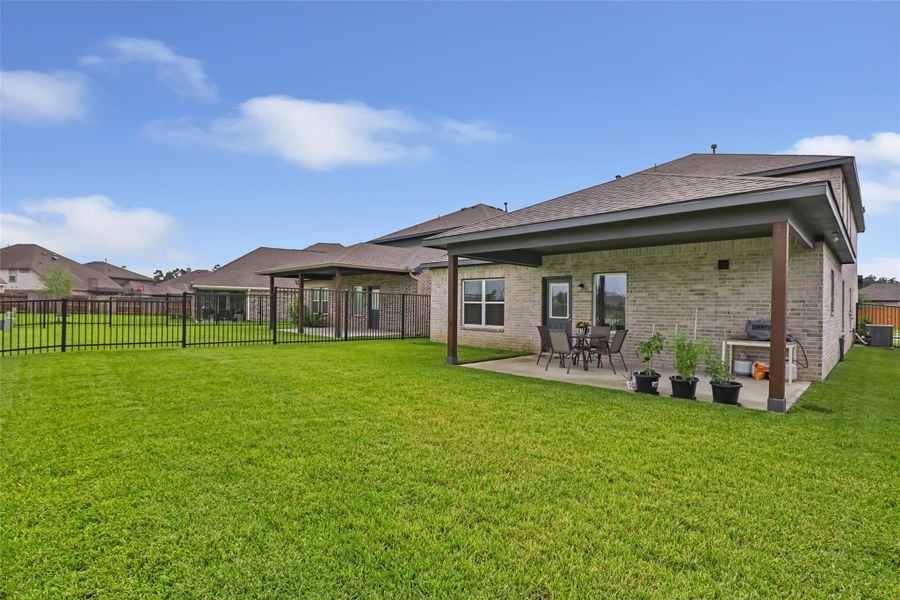 Exterior details and patio area of a home in , Houston (Image 21). Exterior details and patio area of a home in , Houston (Image 21).