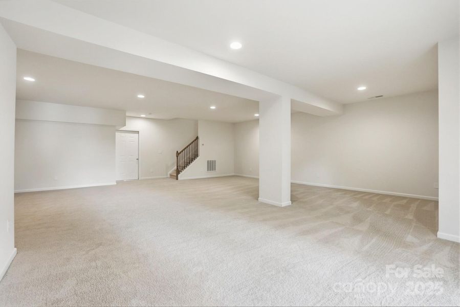 Lower level Rec room Virtually staged Lower level Rec room Virtually staged