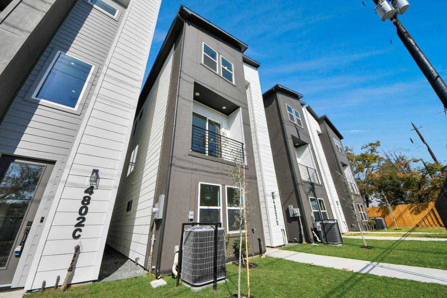 Front exterior of a new home in , Houston, TX, highlighting curb appeal (Image 26).