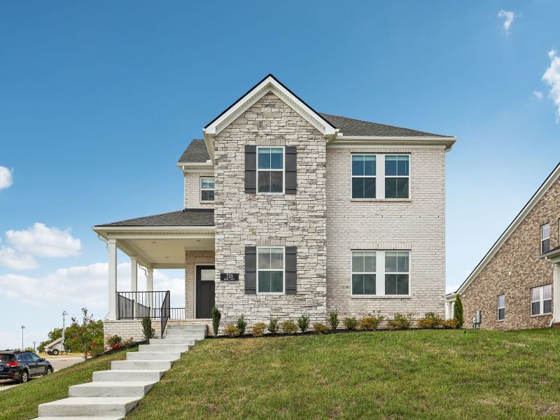 Front exterior of a new home in Benders Cove - Premier Series, Mount Juliet, TN, highlighting curb appeal (Image 1). Front exterior of a new home in Benders Cove - Premier Series, Mount Juliet, TN, highlighting curb appeal (Image 1).