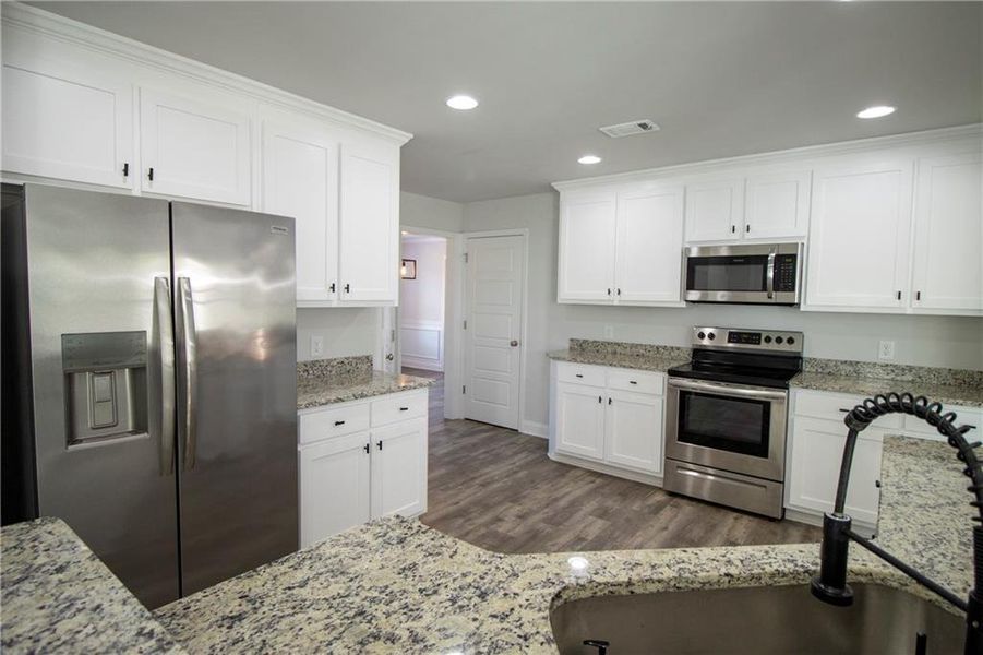 Furnished interior view inside a new home in , Winder (Image 9). Furnished interior view inside a new home in , Winder (Image 9).