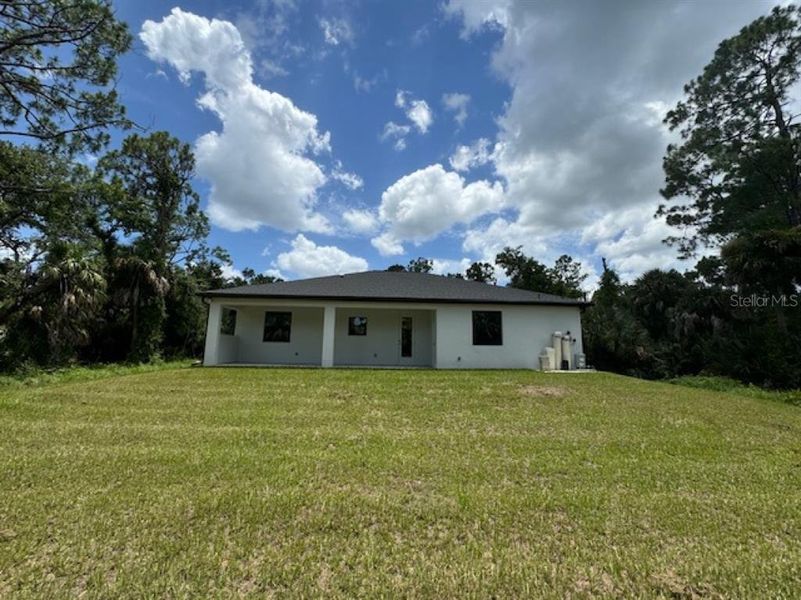 Exterior details and patio area of a home in , Port Charlotte (Image 3).