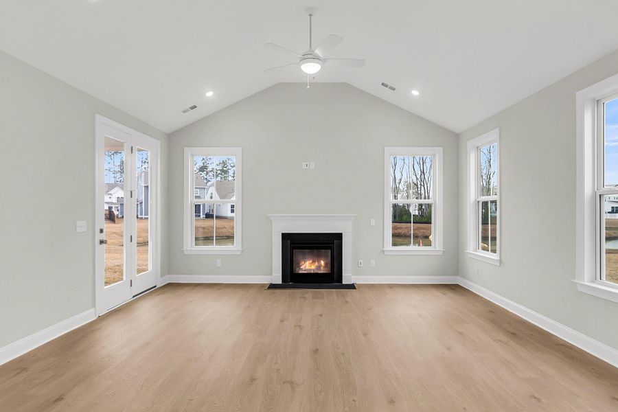 Spacious, unfurnished interior of a new home in Tidewater at Lakes of Cane Bay, Summerville (Image 41).