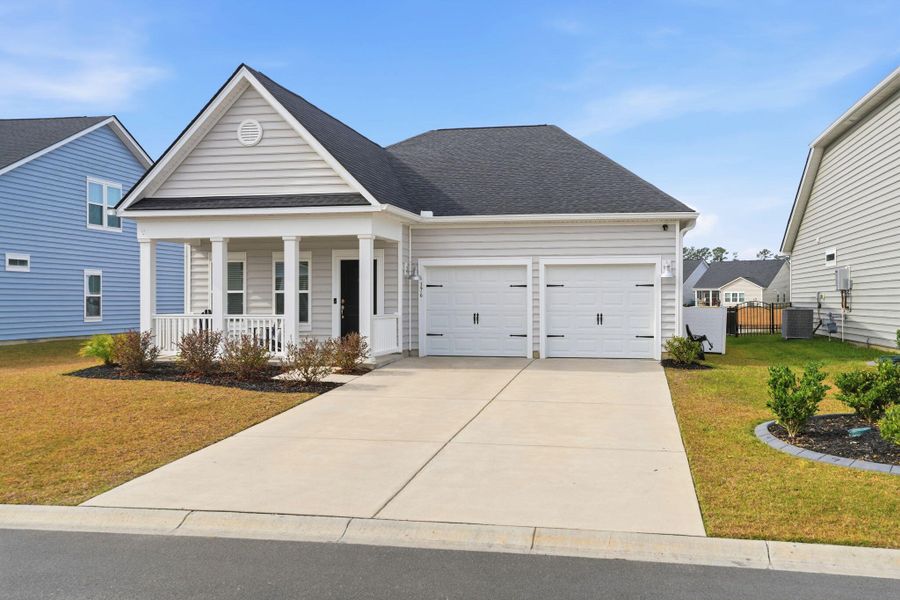 Front exterior of a new home in , Myrtle Beach, SC, highlighting curb appeal (Image 22). Front exterior of a new home in , Myrtle Beach, SC, highlighting curb appeal (Image 22).