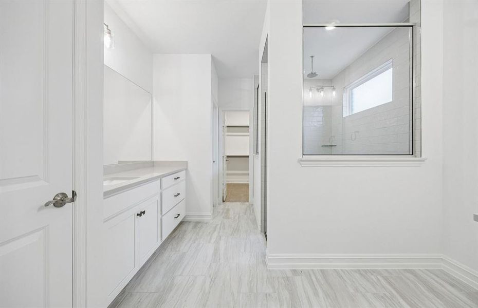 Owner's private bathroom with double vanity