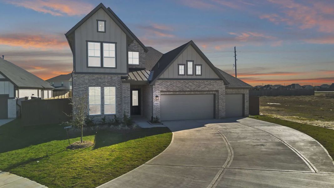 Representative exterior photo of a completed home built from the Cayman by Chesmar Homes in Blue Heron, Mont Belvieu, TX (Image 28). Representative exterior photo of a completed home built from the Cayman by Chesmar Homes in Blue Heron, Mont Belvieu, TX (Image 28).