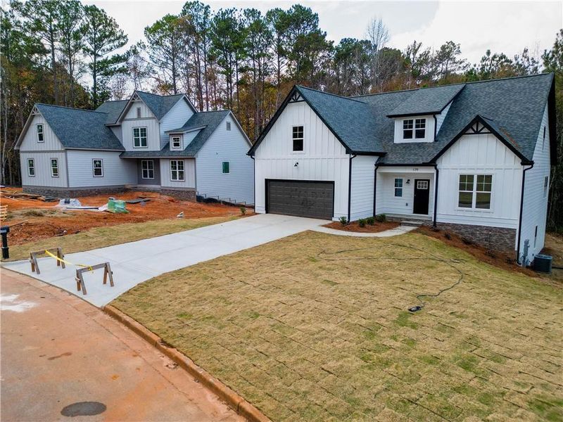Front exterior of a new home in , Villa Rica, GA, highlighting curb appeal (Image 18).