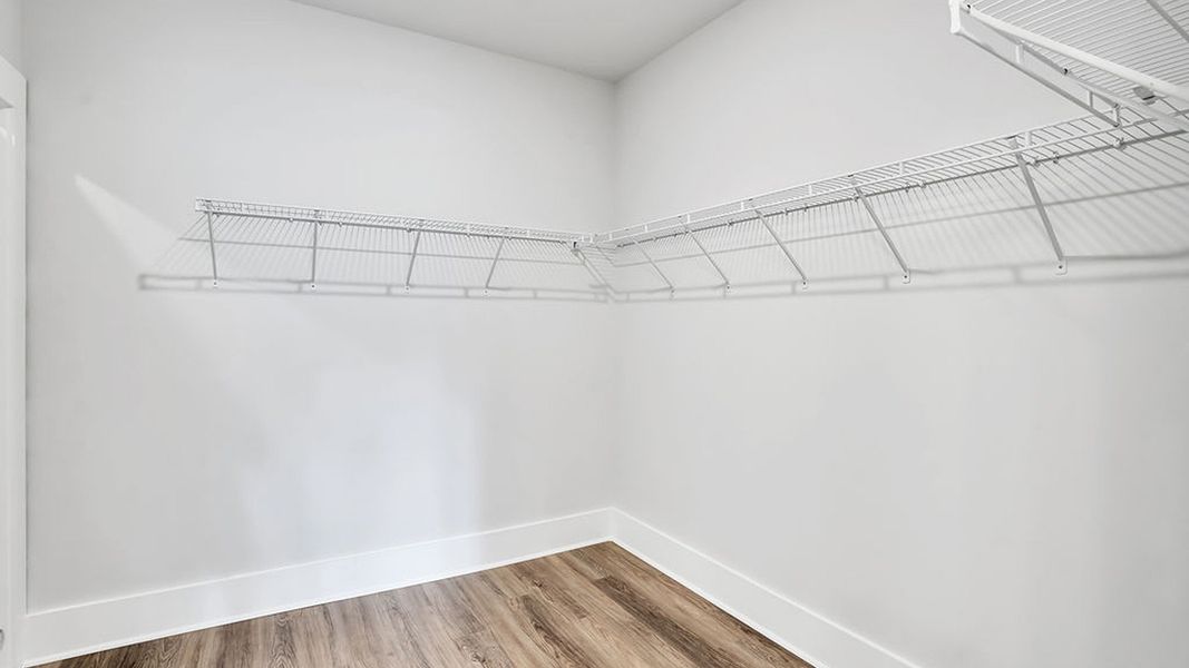 Representative unfurnished interior of a home built from the BRADFORD by D.R. Horton in Indigo Preserve, Leland (Image 31).