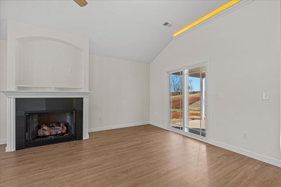 Representative unfurnished interior of a home built from the Cheshire by Enchanted Homes in Hampshire Heights, Moore (Image 33).