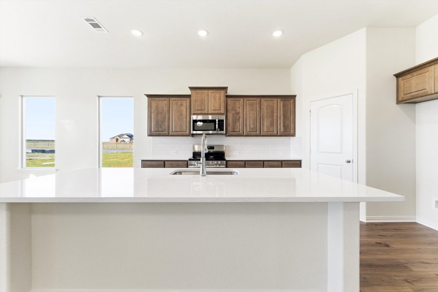 Furnished interior view inside a new home in Clear Sky Addition, Valley View (Image 10).