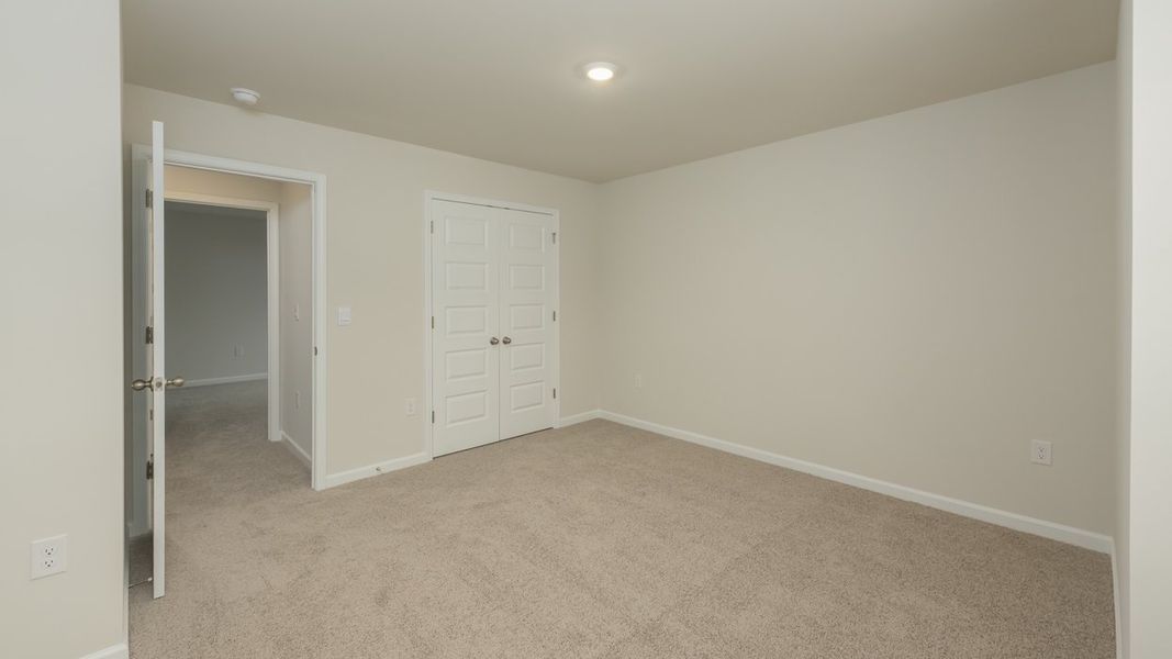 Spacious, unfurnished interior of a new home in Brooks Station, Dacula (Image 34).