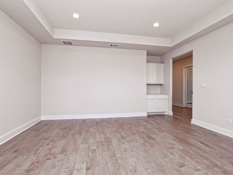 Representative unfurnished interior of a home built from the Emerald II by Giddens Homes in Riverstone, Georgetown (Image 26).