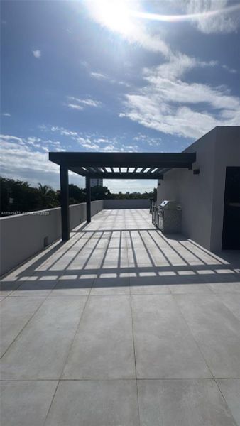 Exterior details and patio area of a home in , Miami (Image 3).