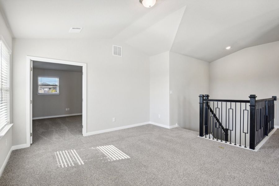 Second floor landing in the Medina floorplan at a Meritage Homes community.