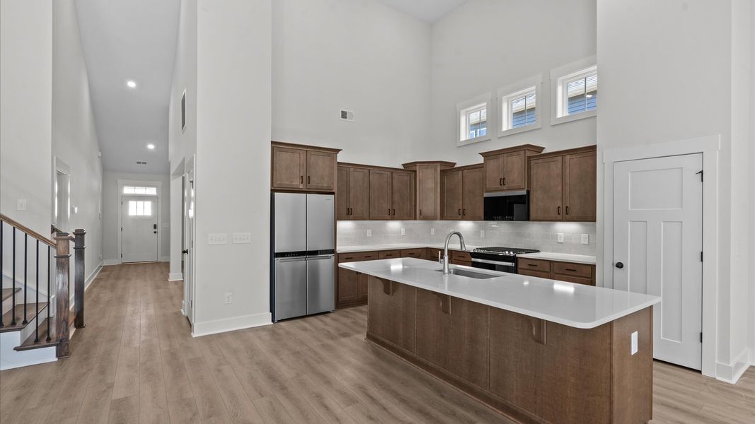 Notable kitchen space with a large island perfect for entertaining Notable kitchen space with a large island perfect for entertaining