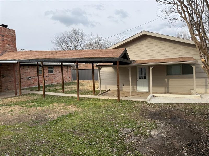 Exterior details and patio area of a home in , Joshua (Image 3).