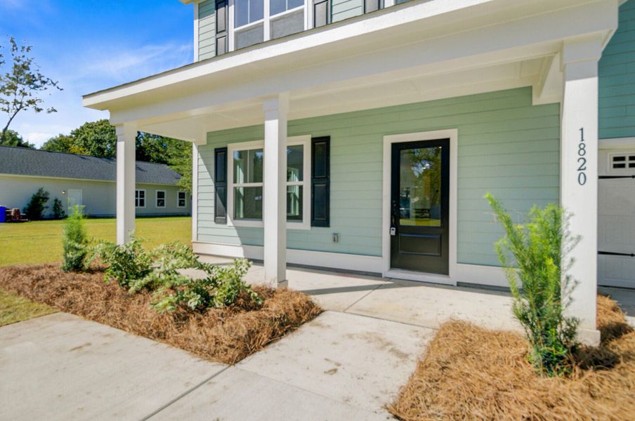 Exterior details and patio area of a home in , Charleston (Image 3).