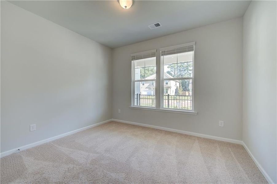 Spacious, unfurnished interior of a new home in Cooper Park, McDonough (Image 9).