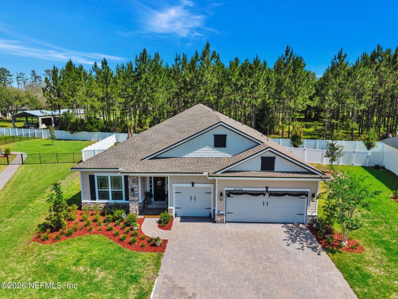 Front exterior of a new home in , Yulee, FL, highlighting curb appeal (Image 26).