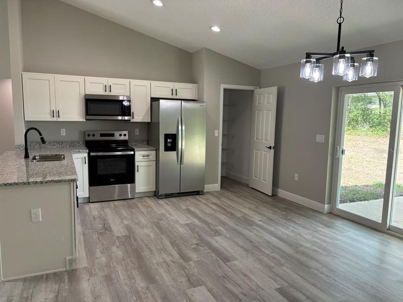Furnished interior view inside a new home in , Dunnellon (Image 9).
