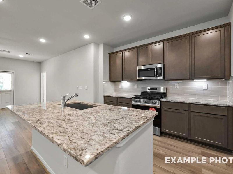 Furnished interior view inside a new home in Caney Creek Place, Conroe (Image 6).