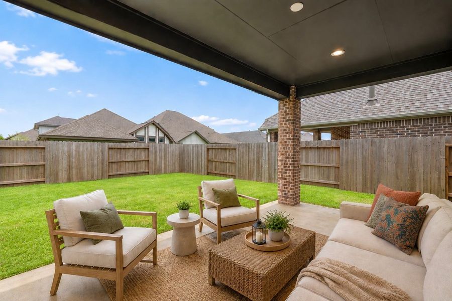 Step outside to the covered patio, the perfect place to relax, entertain, or enjoy peaceful evenings outdoors. *VIRTUALLY STAGED