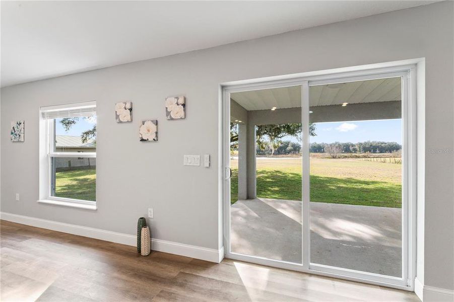 sliding doors out to Oversized covered patio