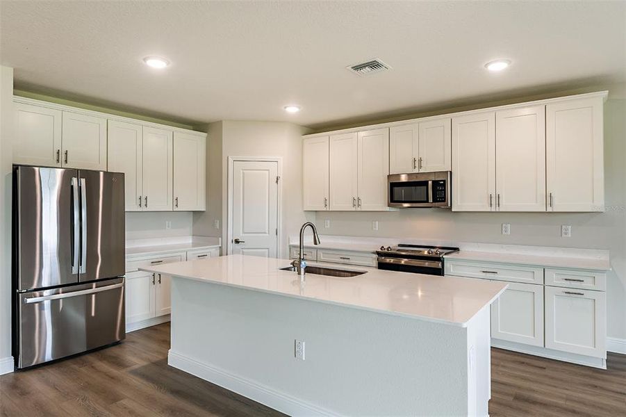 Furnished interior view inside a new home in Pasadena Landing, Wesley Chapel (Image 6). Furnished interior view inside a new home in Pasadena Landing, Wesley Chapel (Image 6).