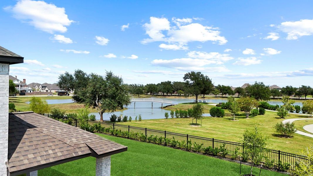 Scenic backyard view with ample green space and fenced yard, offering privacy and outdoor enjoyment. Scenic backyard view with ample green space and fenced yard, offering privacy and outdoor enjoyment.