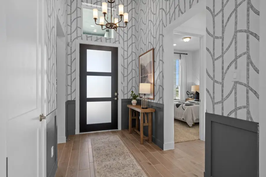 Representative furnished interior of a home built from the Bonneville by Chesmar Homes in University Heights, Round Rock (Image 4).