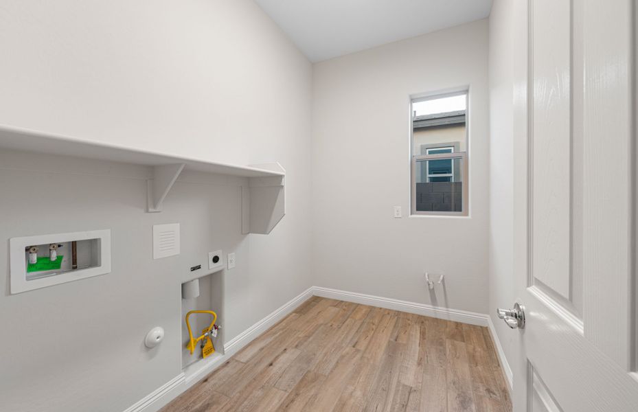 Spacious, unfurnished interior of a new home in Artisan at Asante, Surprise (Image 23).