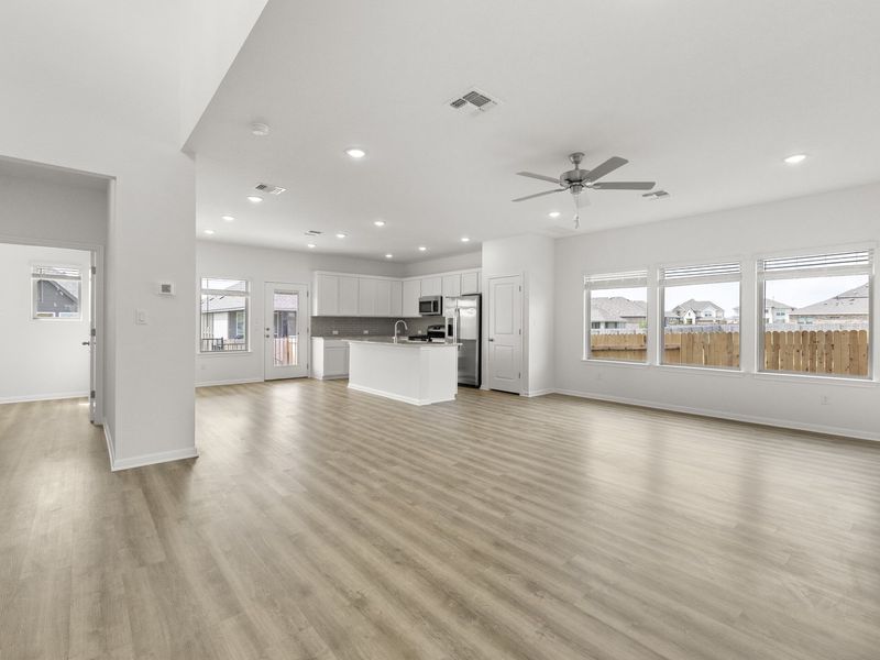 Representative unfurnished interior of a home built from the Dallas by Pacesetter Homes in Crosswinds, Kyle (Image 15).