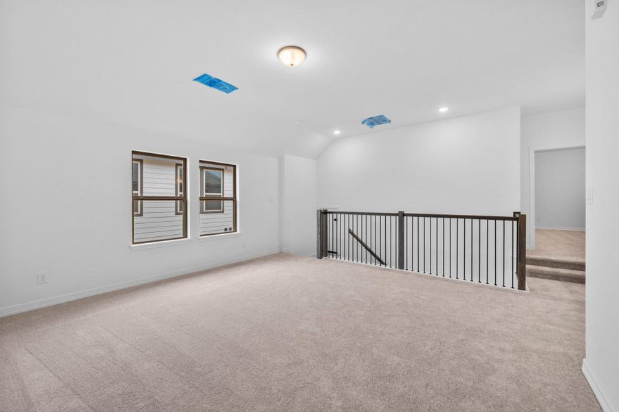 The loft provides an open, comfortable space for relaxing, entertaining, or unwinding together.